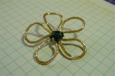 My double wire flower, set in a beautiful vintage pressed clear glass base, can hold so many different things in charming style! a Good Life: bubbly scrumptious update...simple wire ...