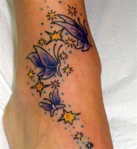 Nice Purple Butterflies And Yellow Stars Tattoo On Foot Tattooimagesbiz