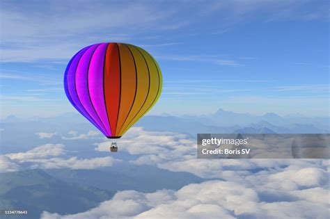 Hot Air Balloon Over The Mountain Range High Res Stock Photo Getty Images
