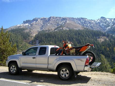 However, here you want two or more men to lift and then load on the kayak. Hualing a motorcycle in a 5ft. truck bed - good or not ...