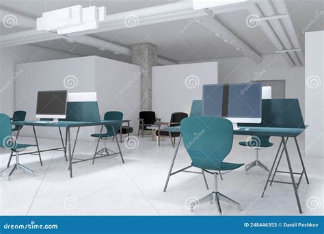 Modern Coworking Office Interior With Empty Computer Screens On Desks