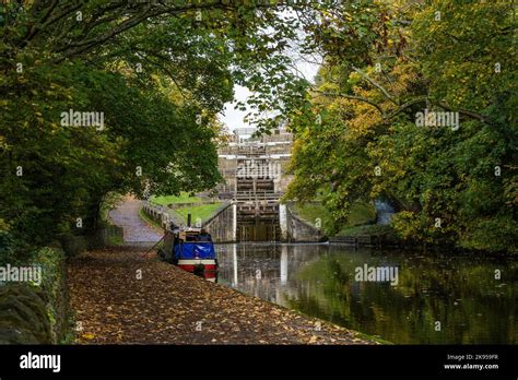 A Barge Narrowboat Is Moored Up At The Side Of The Leeds Liverpool