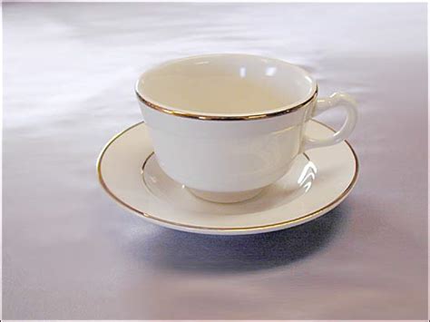 Gold Rimmed Coffee Cup Uptown Rentals