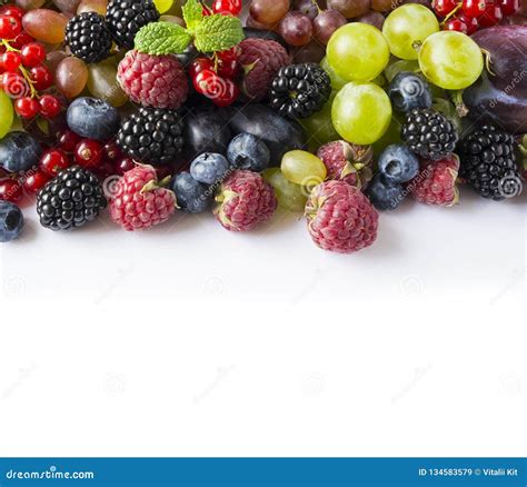 Mix Berries And Fruits On A White Background Fresh Raspberries Red