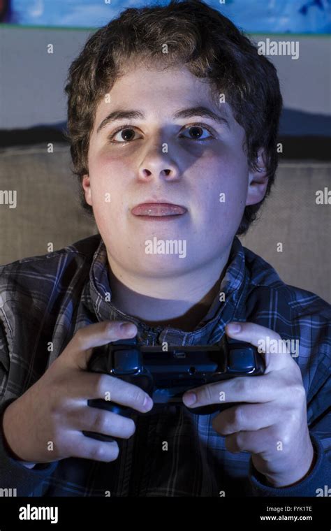 Happy Boy With Joystick Playing Computer Game At Home Stock Photo Alamy