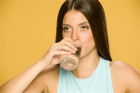 Young Woman Drinking Water From A Glass Stock Photo Image Of