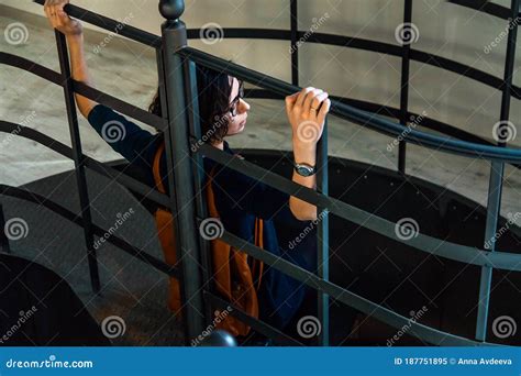 Girl Leaning With Her Back On The Metal Railings Stock Image Image Of