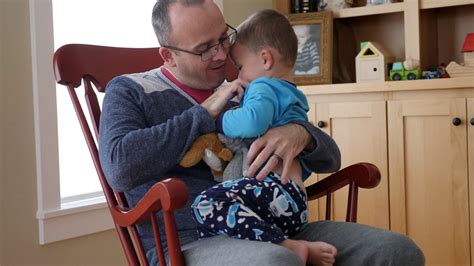5 out of 5 stars. A Father Tickles His Toddler In A Rocking Chair In House ...