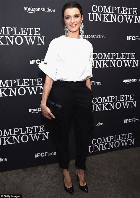 Simply Chic The Wore A White Blouse High Waisted Black Trousers And