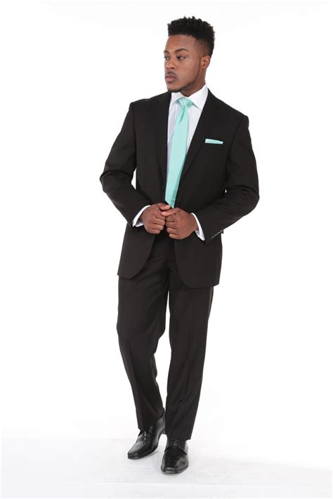 Classic black won't go anywhere from men's wedding suits 2021 trends, but it will give way to bright colors: Milroy's Tuxedos - Black Wedding Suit
