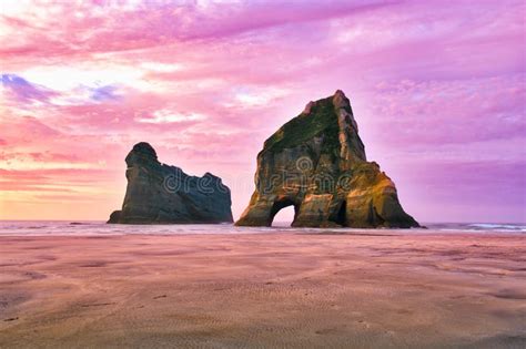 The Archway Islands Just Off Wharariki Beach At Sunset Stock Image