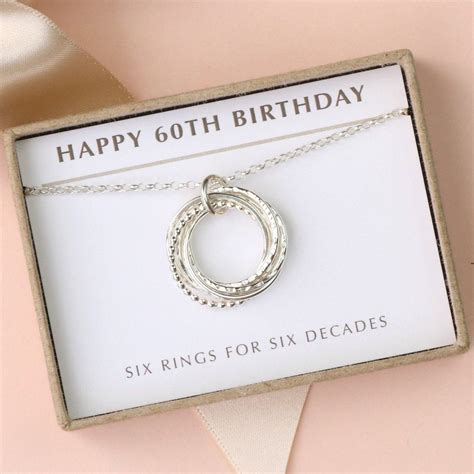 There are a brooch, key chain, watch scarf, ribbons and many more. 60th Birthday Silver Necklace | 6 Rings for 6 Decades ...