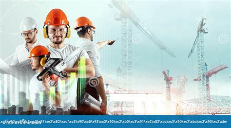 A Team Of Engineers Builders On The Background Of A Construction Site
