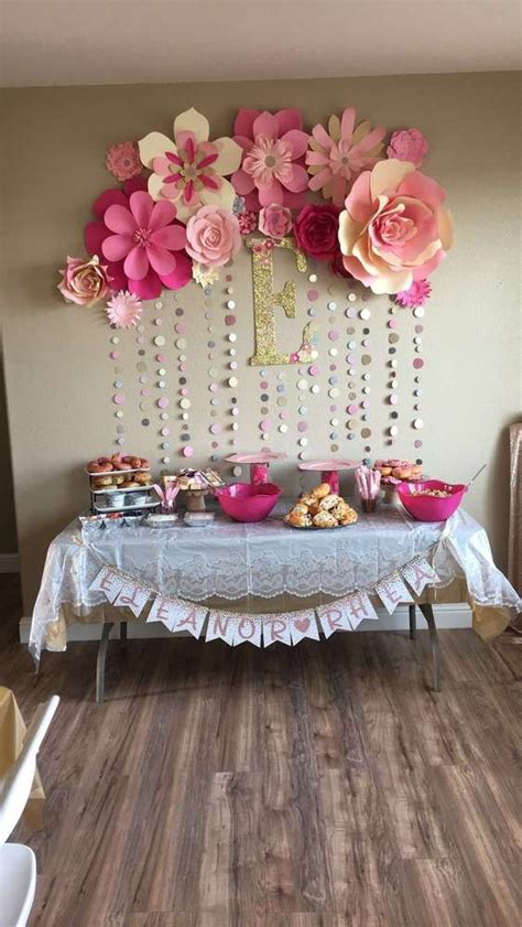 Since baby showers are often happy reunions of family and friends, they'll love having a pretty place for photo opps! Pink and gold Baby Shower Party Ideas | Photo 2 of 12 ...
