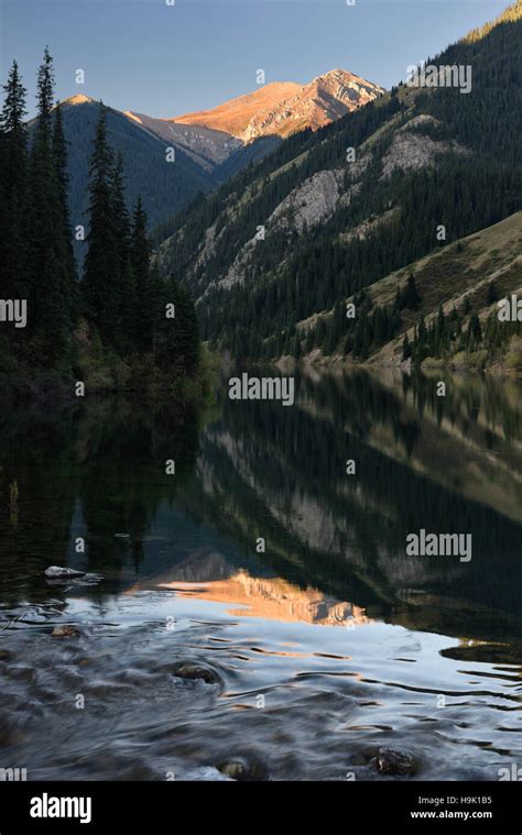 Sunny Peak Reflected In Lower Kolsai Lake In Kungey Alatau Mountains