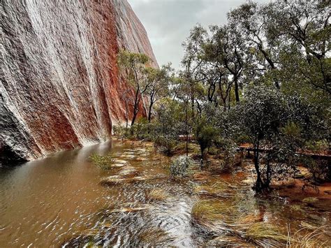 Northern Territory Weather Rain Falls On Uluru National Park Waterfalls Gushing The Courier Mail