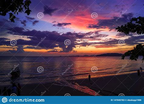 Beautiful Sunset With Red Purple And Yellow Colors At The Beach In