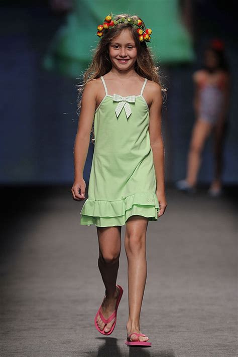 Children's fashion show of beachwear on the catwalk. Swimwear Fashion Show Gran Canaria Moda Cálida 2013 | hola.com