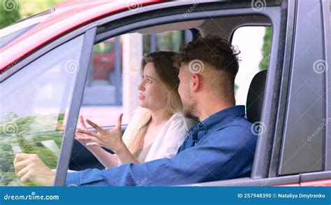 Close Up Of Caucasian Positive Woman Sitting In Front Seat In The Car