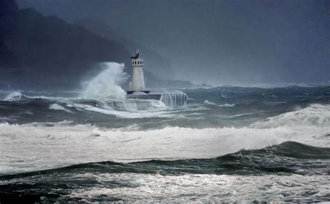 Lighthouse With Crashing Waves