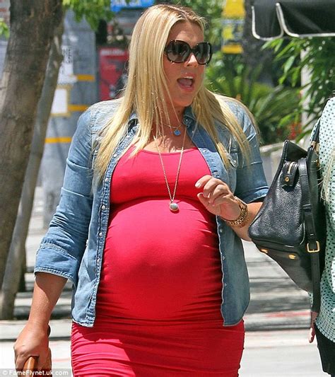 Busy Philipps Displays Her Huge Baby Bump In A Fitted Red Dress As Her