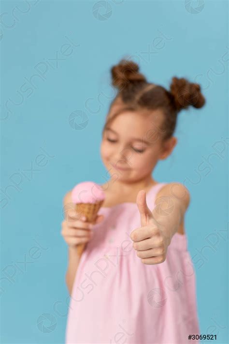 Smiling Little Girl Holding Vanilla Ice Cream Stock Photo 3069521