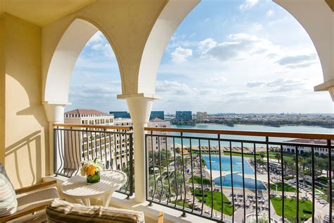 the ritz carlton abu dhabi grand canal hotel abu dhabi uae guest room balcony travoh