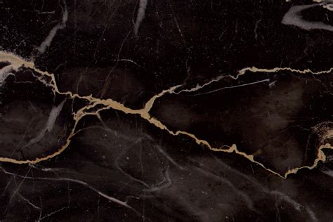 Offering a dark background, it makes for an elegant stone suitable for any space. Portoro Gold | Acemar Marbles