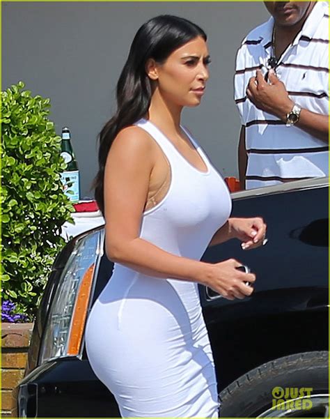 Kim Kardashian Flaunts Curves In Skin Tight White Dress 06 ImageTwist
