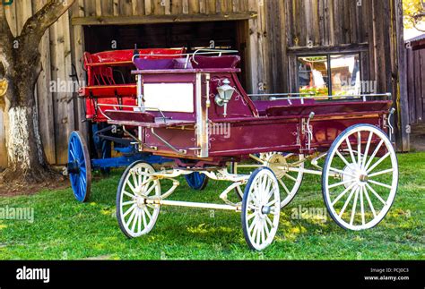 Two Vintage Horse Drawn Wooden Wagons On Display Stock Photo Alamy