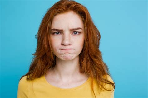 Free Photo Headshot Portrait Of Tender Redhead Teenage Girl With Serious Expression Looking At