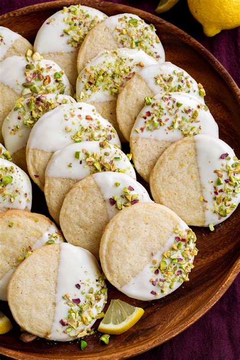 A twist on a classic christmas gingerbread cookie. Lemon Shortbread Cookies (Dipped in White Chocolate ...