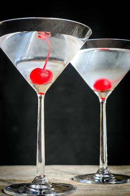 Premium Photo Glasses Of Martini Cocktails With Cherries