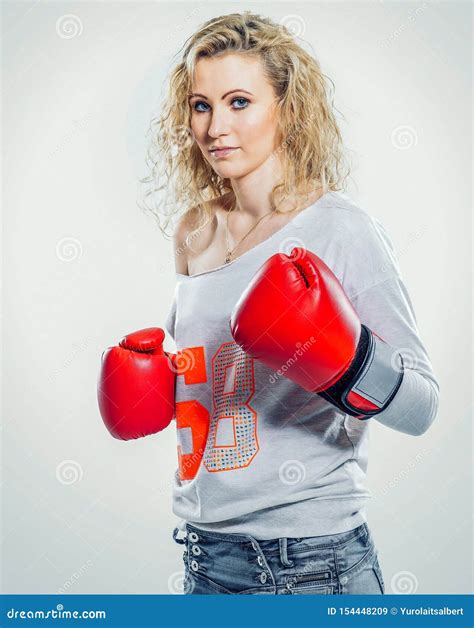 Young Beautiful Woman In Boxing Gloves On White Background Stock Image