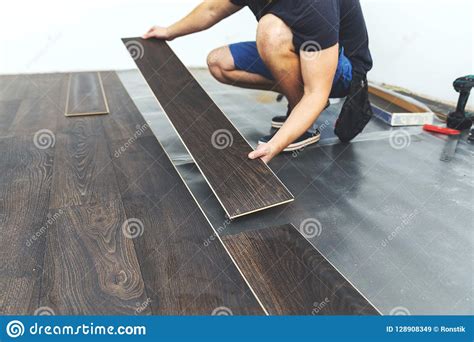 Laminate Flooring Worker Installing New Floor Stock Image Image Of