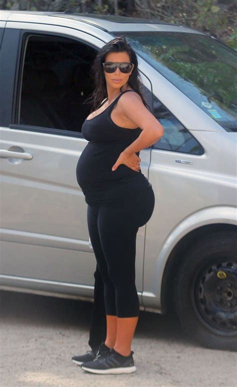 Pregnant Kim Kardashian Shows Off Bump And Bum In Tight