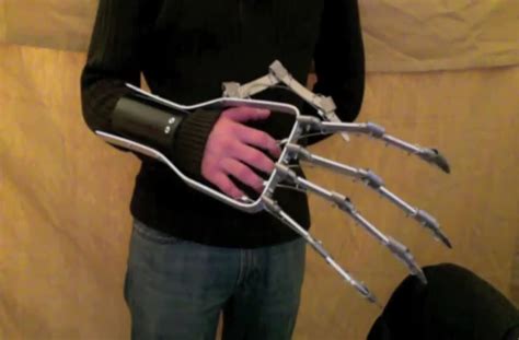 Large Mechanical Hand Mimics The Movements Of The Wearers Hand