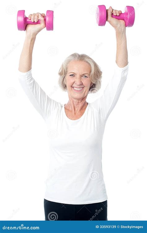 Senior Woman Exercising With Dumbbells Royalty Free Stock Images