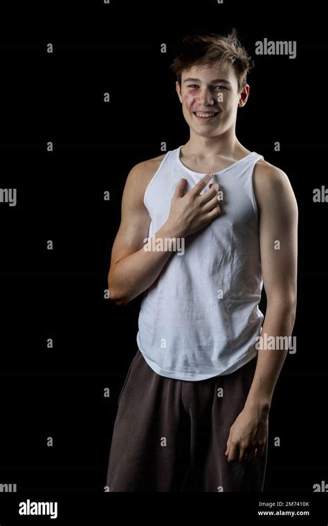 A 17 Year Old Teenage Boy Wearing A White Tank Top Stock Photo Alamy