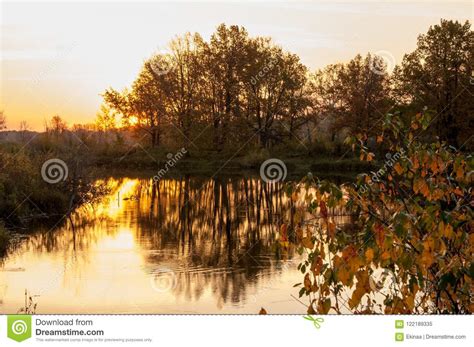 Landscape Sunset Over The Lake Fall Trees Reflected In Water Stock