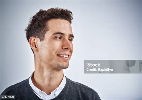 Handsome Young Man Turns Sideways Smiling Stock Photo Download Image
