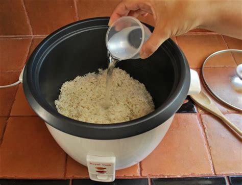 Sure enough, it was about one and one half cups of water to one cup. A Beginner's guide to Cook Rice on a Rice Cookers