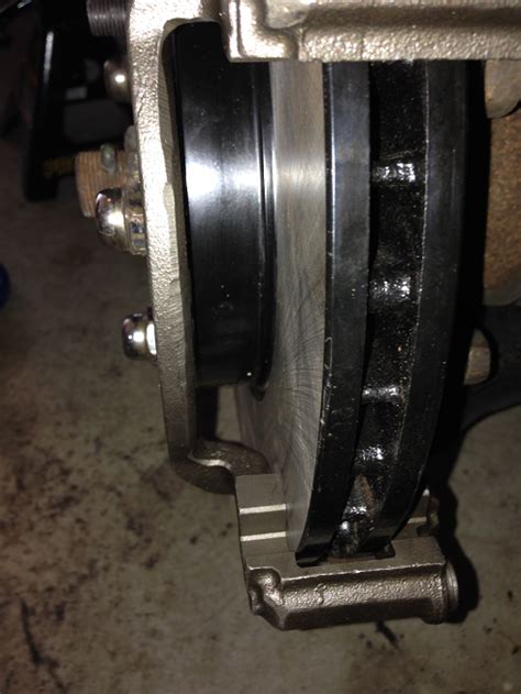 Front Brake Caliper Mounting Bracket Out Of Alignment With Rotor