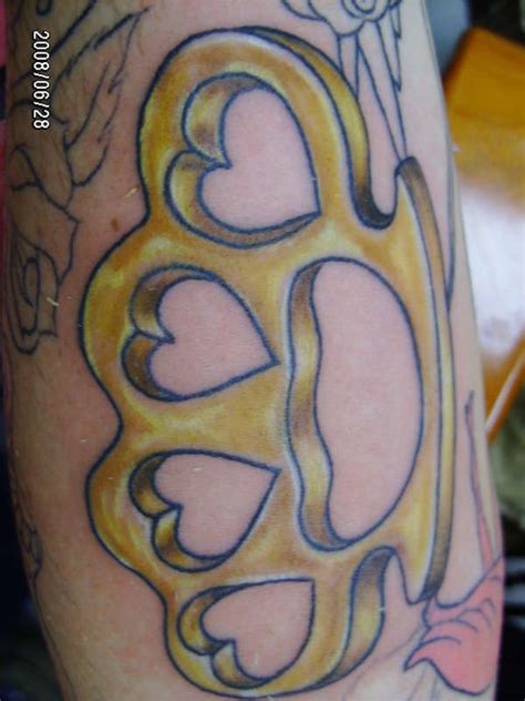 Love Formed Brass Knuckles Tattoo Tattoomagz › Tattoo Designs Ink