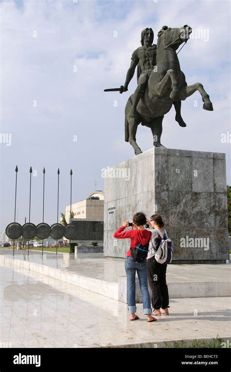 Tourists Photographing The Statue Of Alexander The Great On Horseback