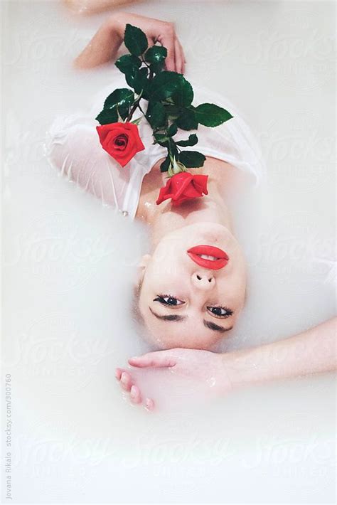 An Attractive Young Woman Lies In Milk Bath By Jovana Rikalo Milk