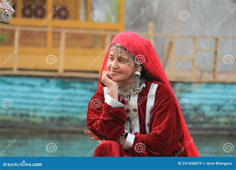 Kashmiri Woman In Traditional Red Dress And Ornaments Stock Image