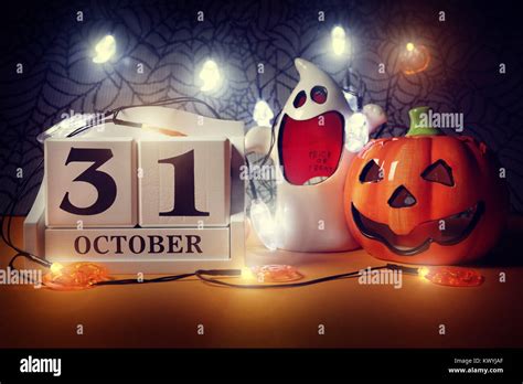Halloween Calendar Date 31st October With Pumpkin And Ghost Stock Photo