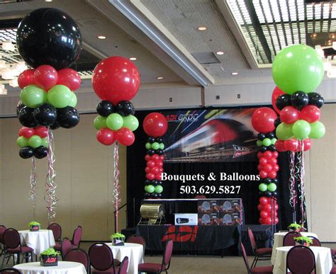Balloon Columns To Set The Stage And 3 Foot Illusions For Centerpieces