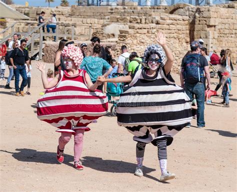 A Participants Of The Purim Festival Dressed In Fabulous Costumes Show